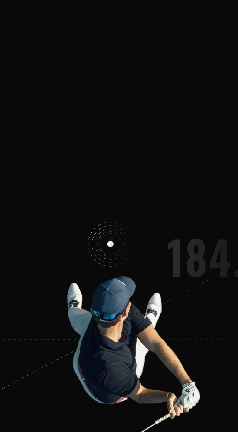 Golfer in mid-swing, wearing a black outfit and blue cap, viewed from above against a black background with a graphic showing "184".